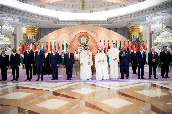 Real world leaders pose for a family portrait ahead of the Arab League Summit, welcoming back Syrian President Bashar al-Assad in Jeddah, Saudi Arabia, May 19, 2023 -handout via Reuters