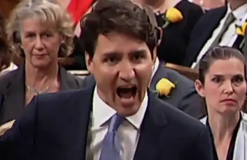 Trudeau adddressing Canadians -spencerfernando.com